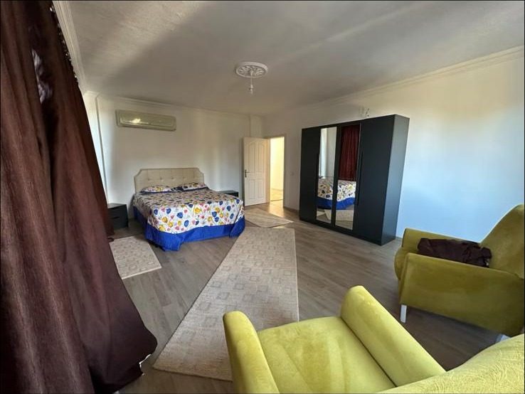 Second bedroom at Gedeller Villa with mirrored wardrobe