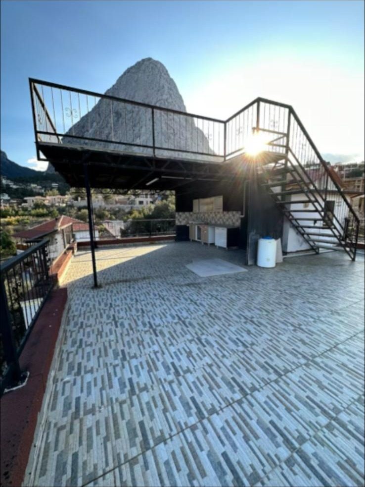 Rooftop terrace staircase at Gedeller Villa